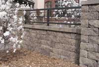 Finished Wall with Ornamental Fence Above