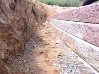 Use Uncolored Retaining Wall Block For Buried Sections