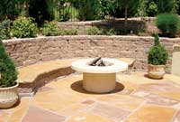 Retaining wall and seating wall around fire pit