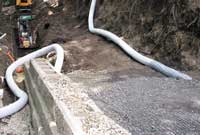 Retaining Wall Construction with Drain Pipe